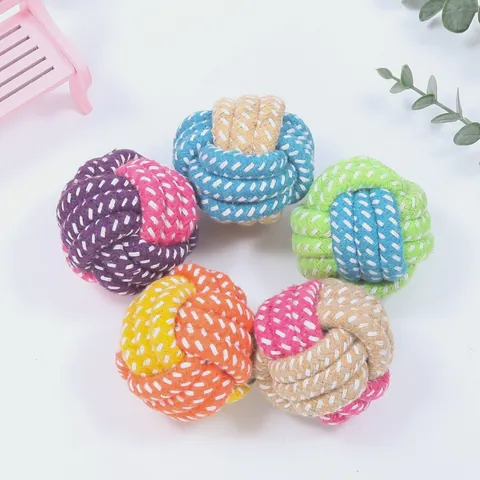 Five round knotted cotton rope balls in mixed bright colours