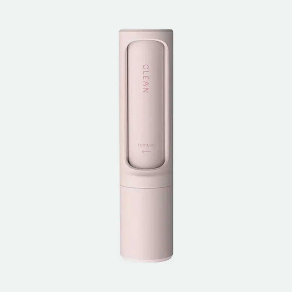 Pink handheld reusable pet hair remover